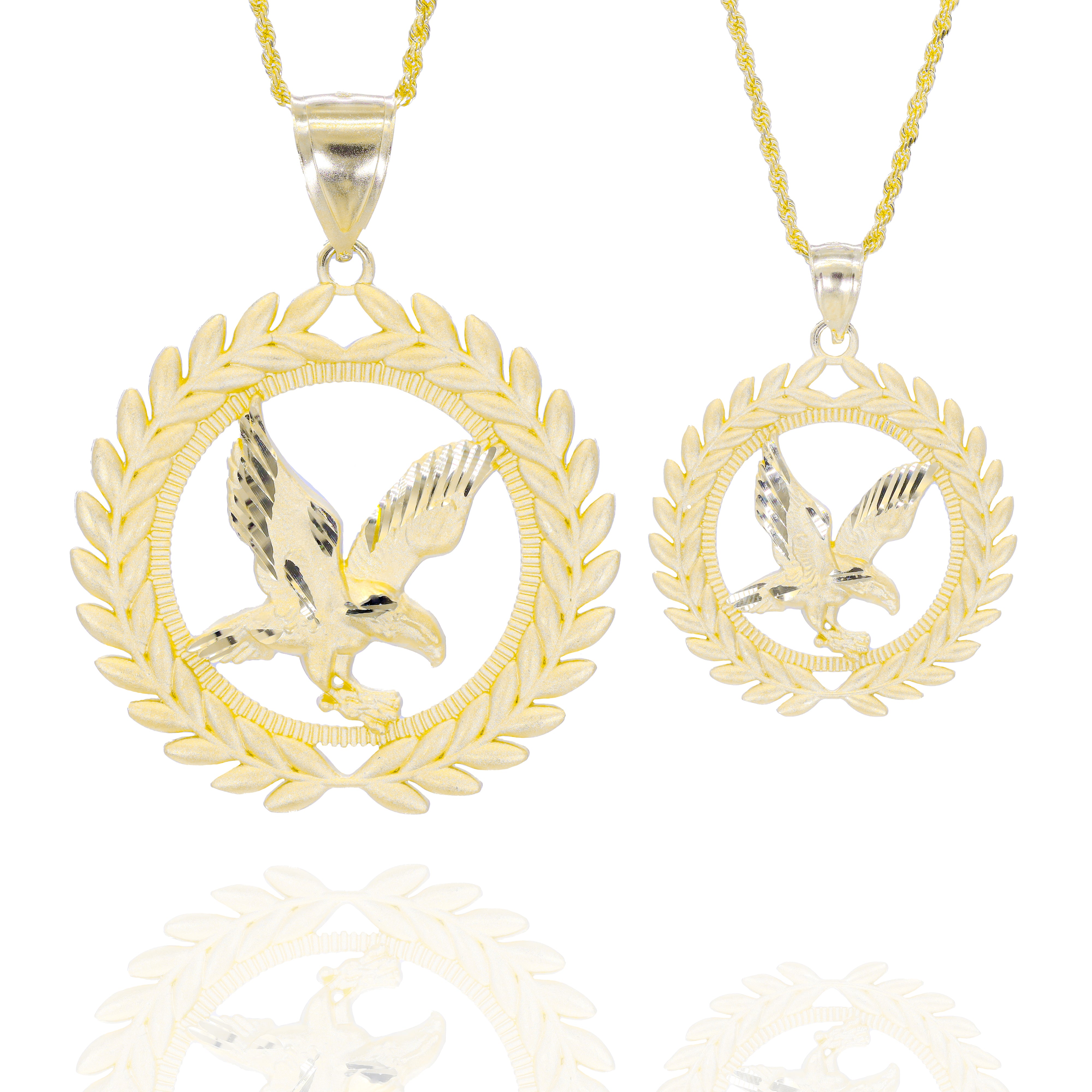 Gold eagle pendant necklace with laurel wreath on a white background