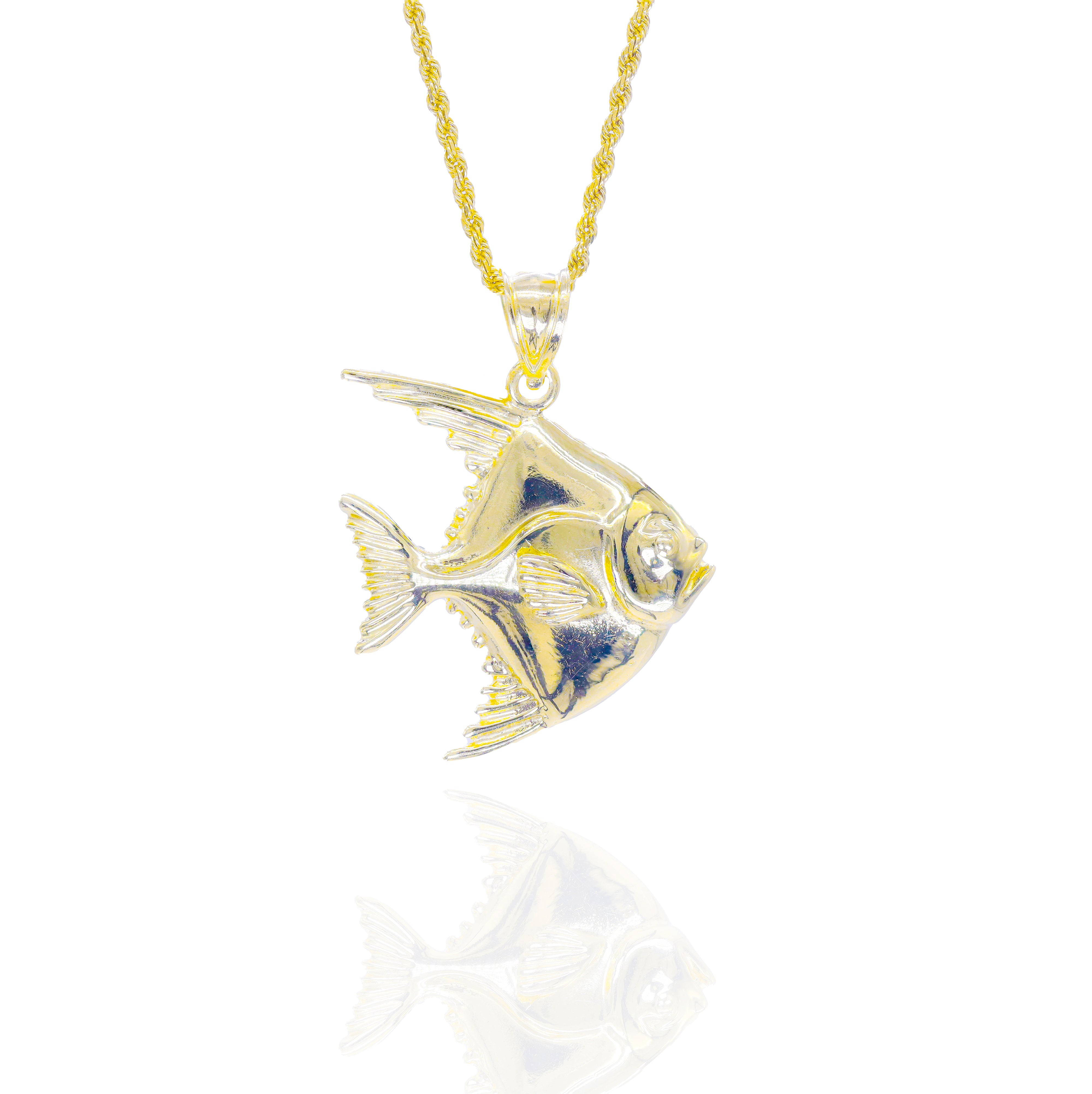 Gold sea fish pendant on a chain