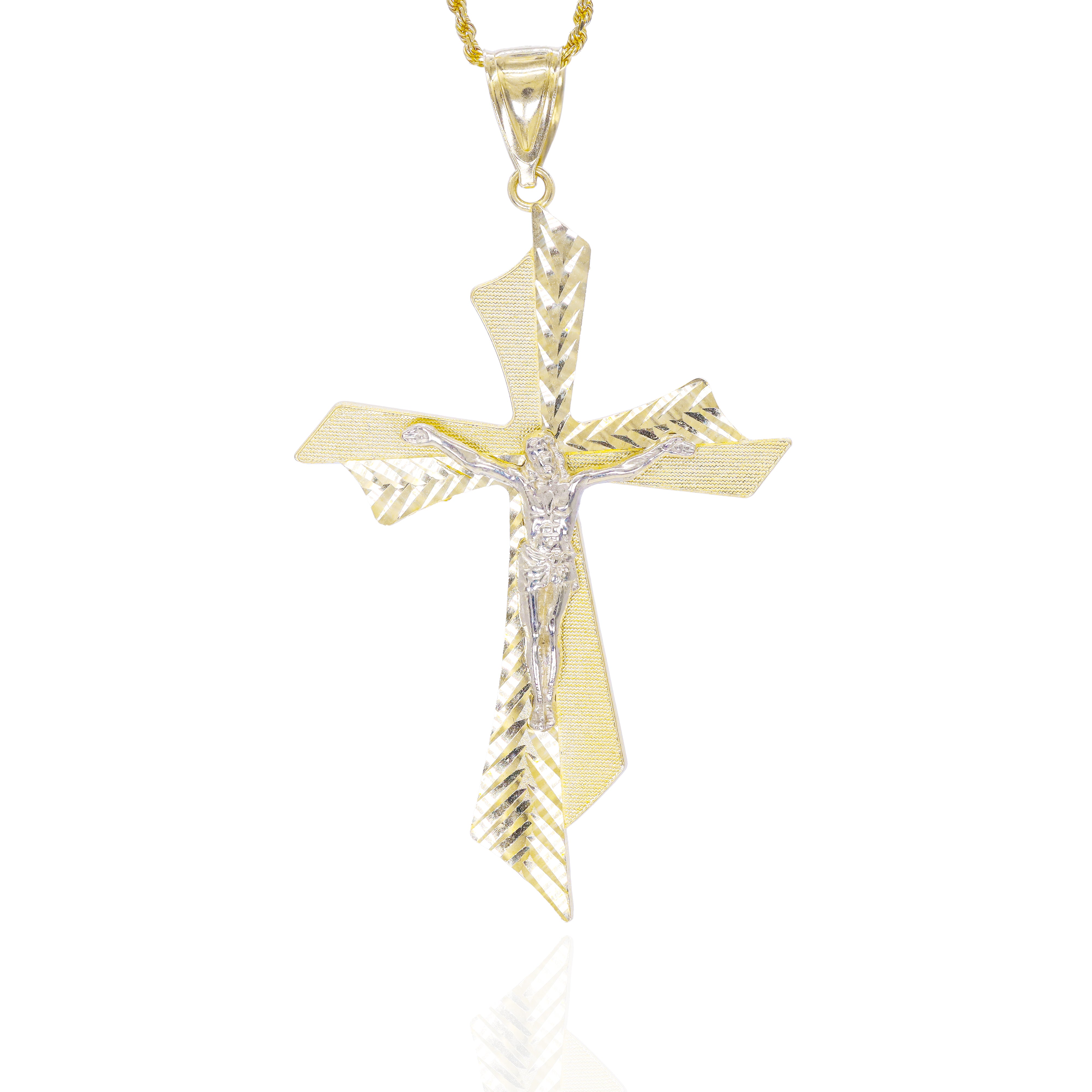Gold cross pendant with Jesus Christ figure with a diamond cut design