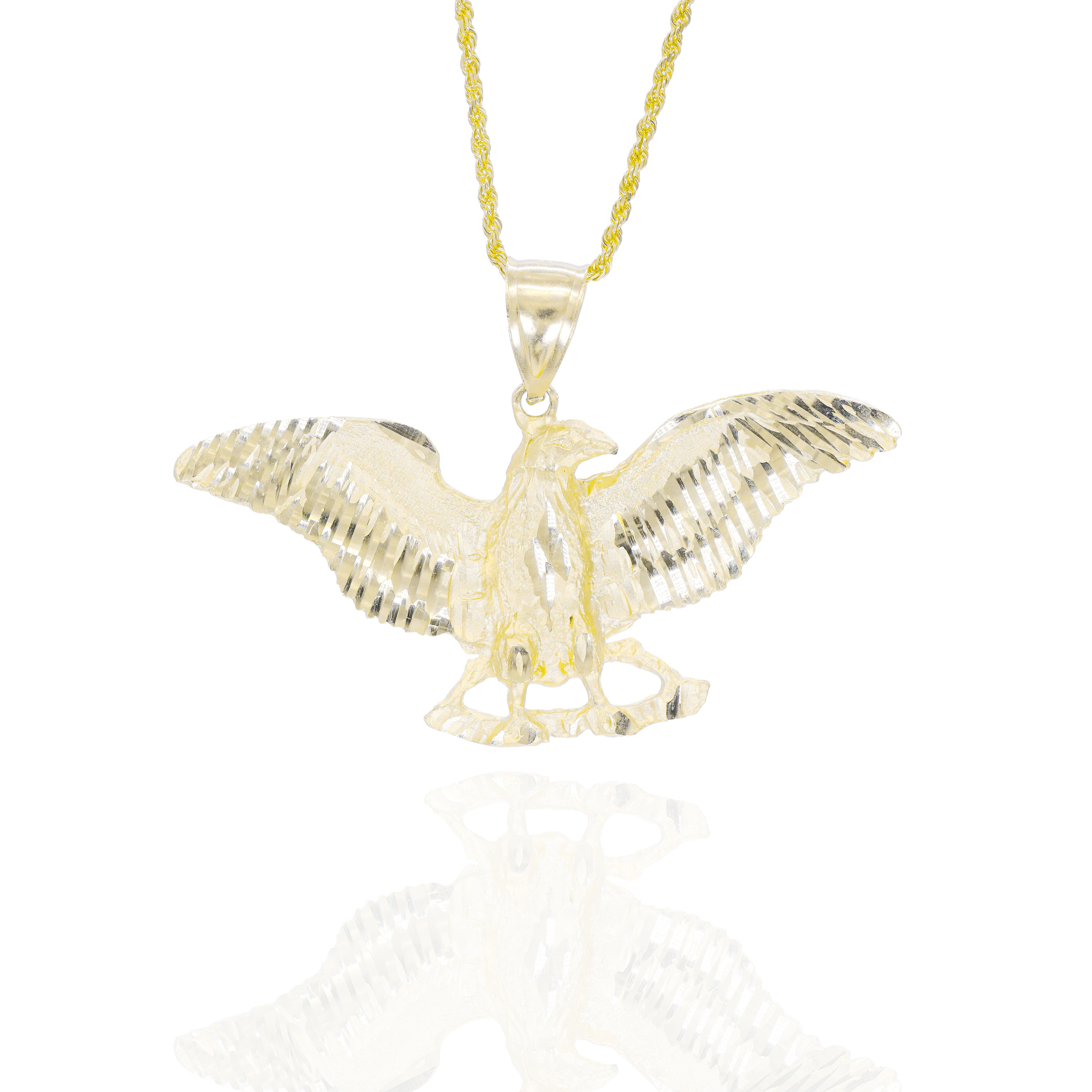 Gold eagle with wings spread pendant on a gold chain