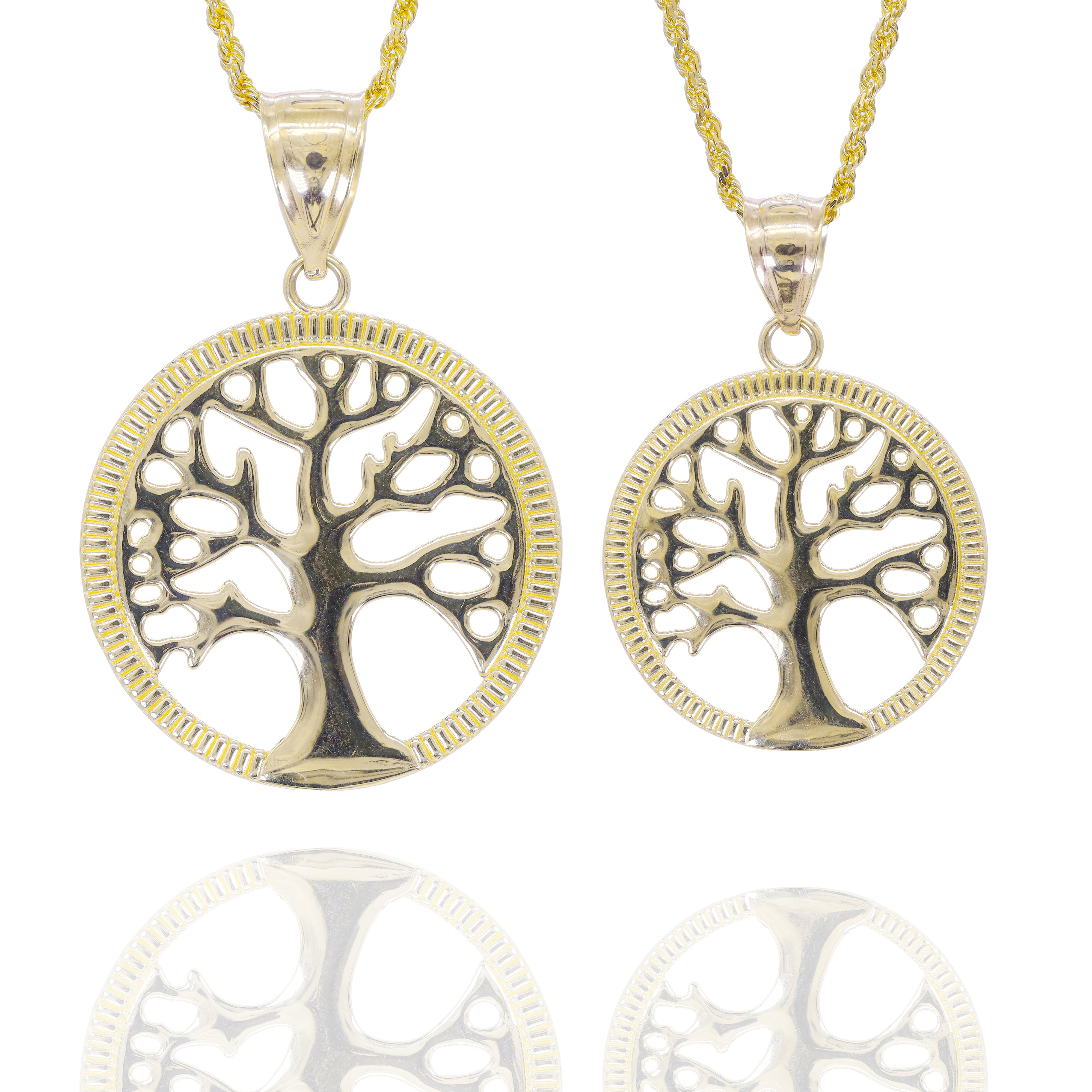 Two different size gold tree-shaped pendants on chains
