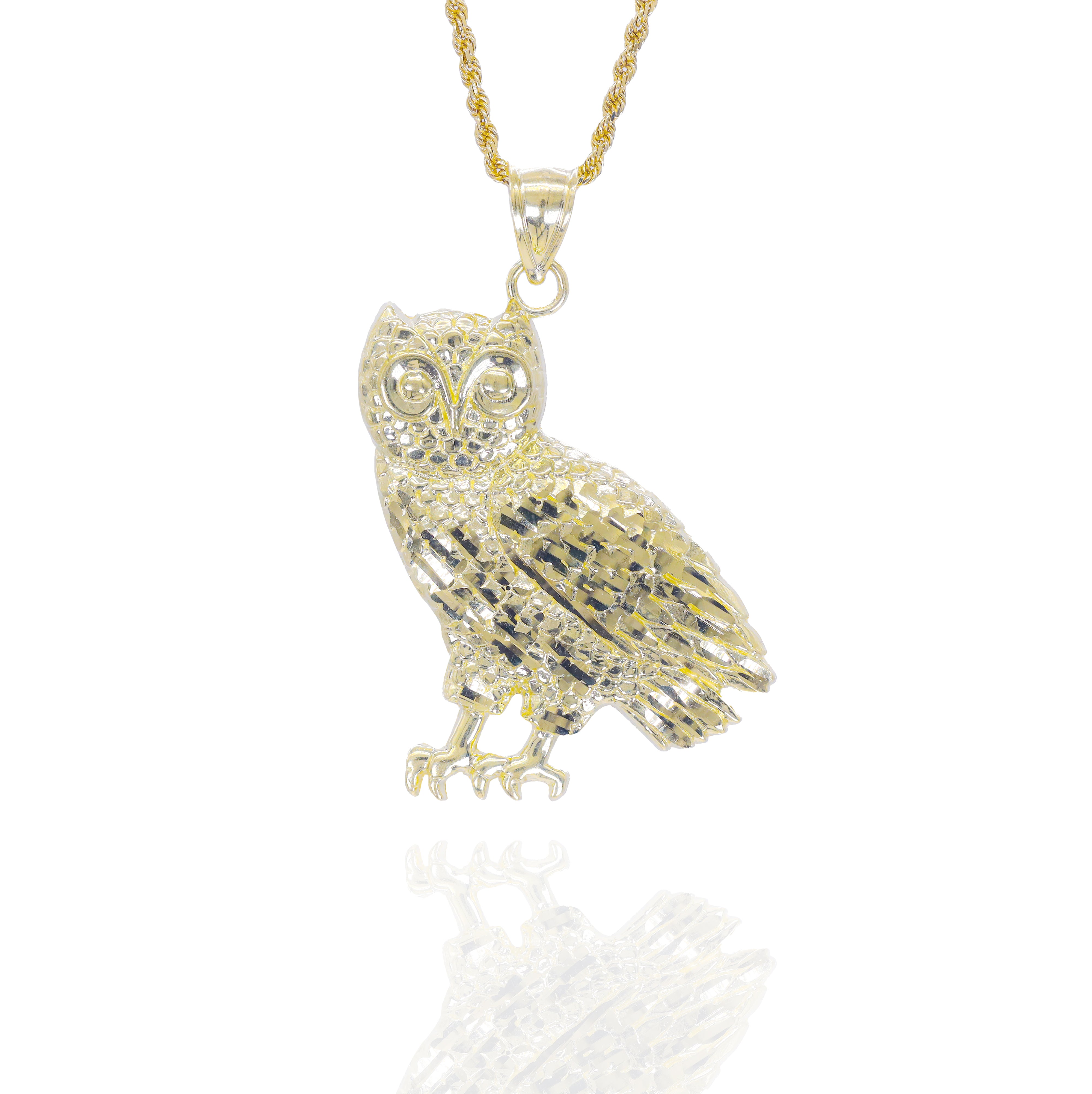 solid Gold owl pendant with a gold chain