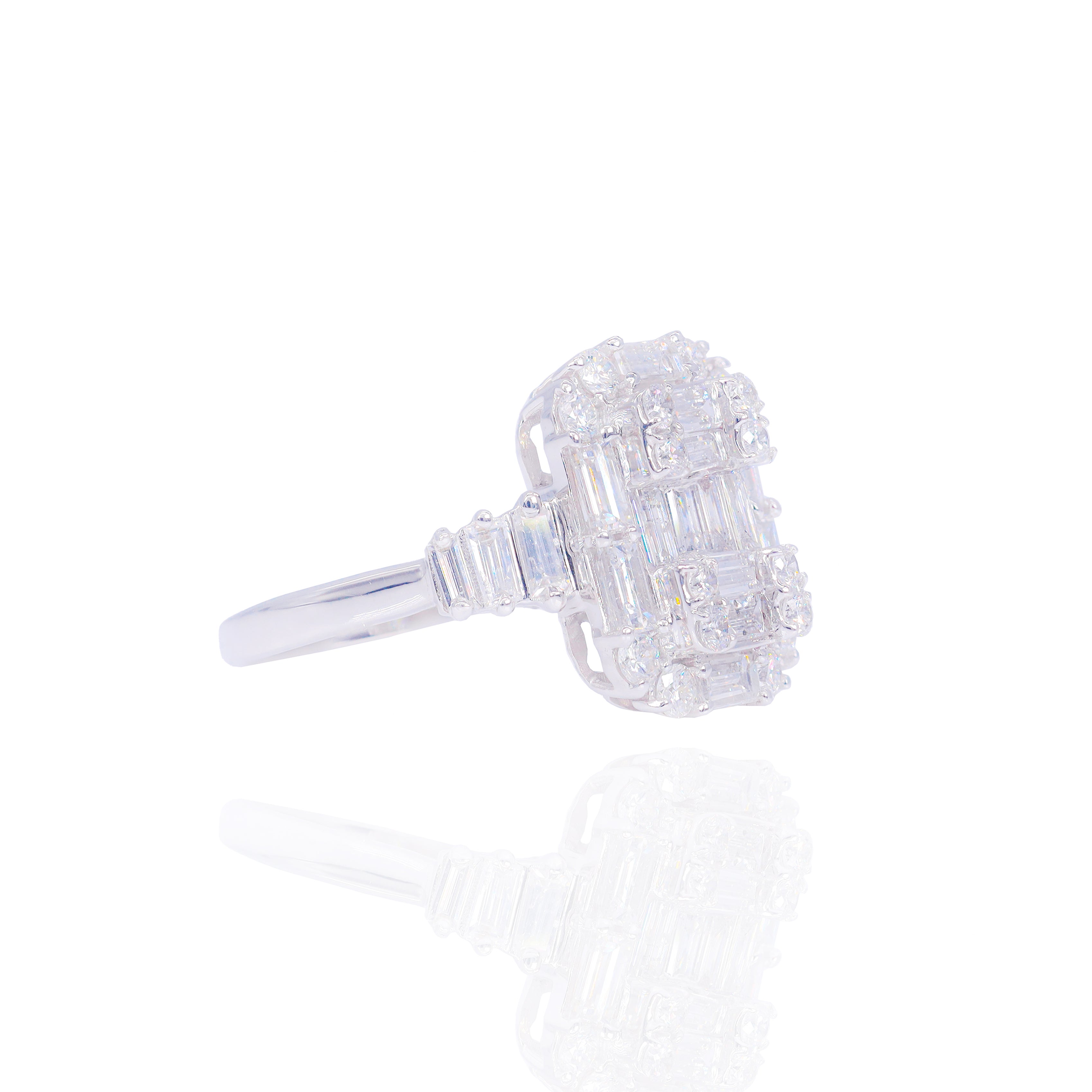 Elongated Emerald & Baguette Diamond Engagement Ring with Halo