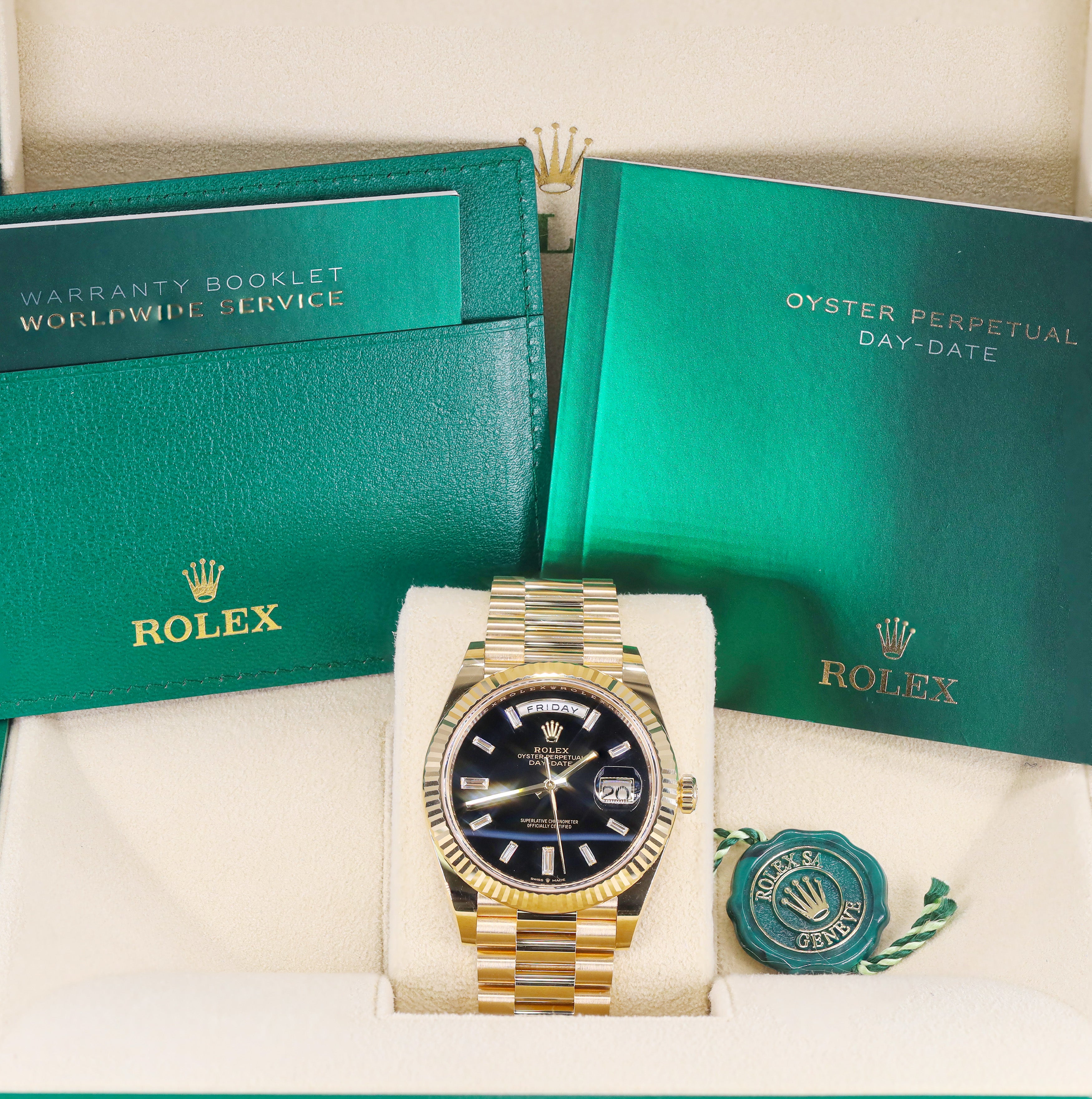 Rolex 228238 Day-Date 40mm Black Onyx Baguette Diamond Dial Yellow Gold