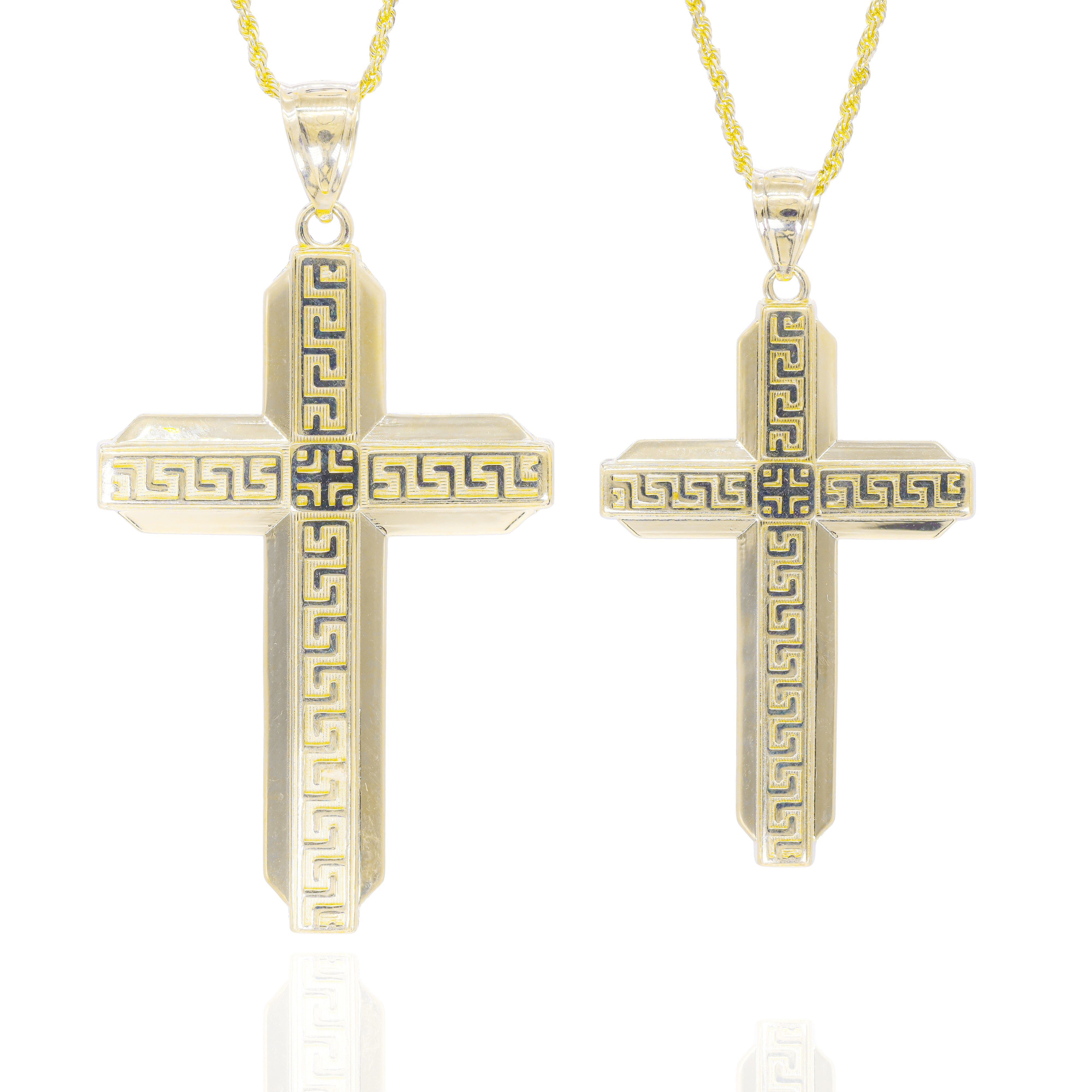 Gold cross pendants with intricate Greek key designs on a gold chain