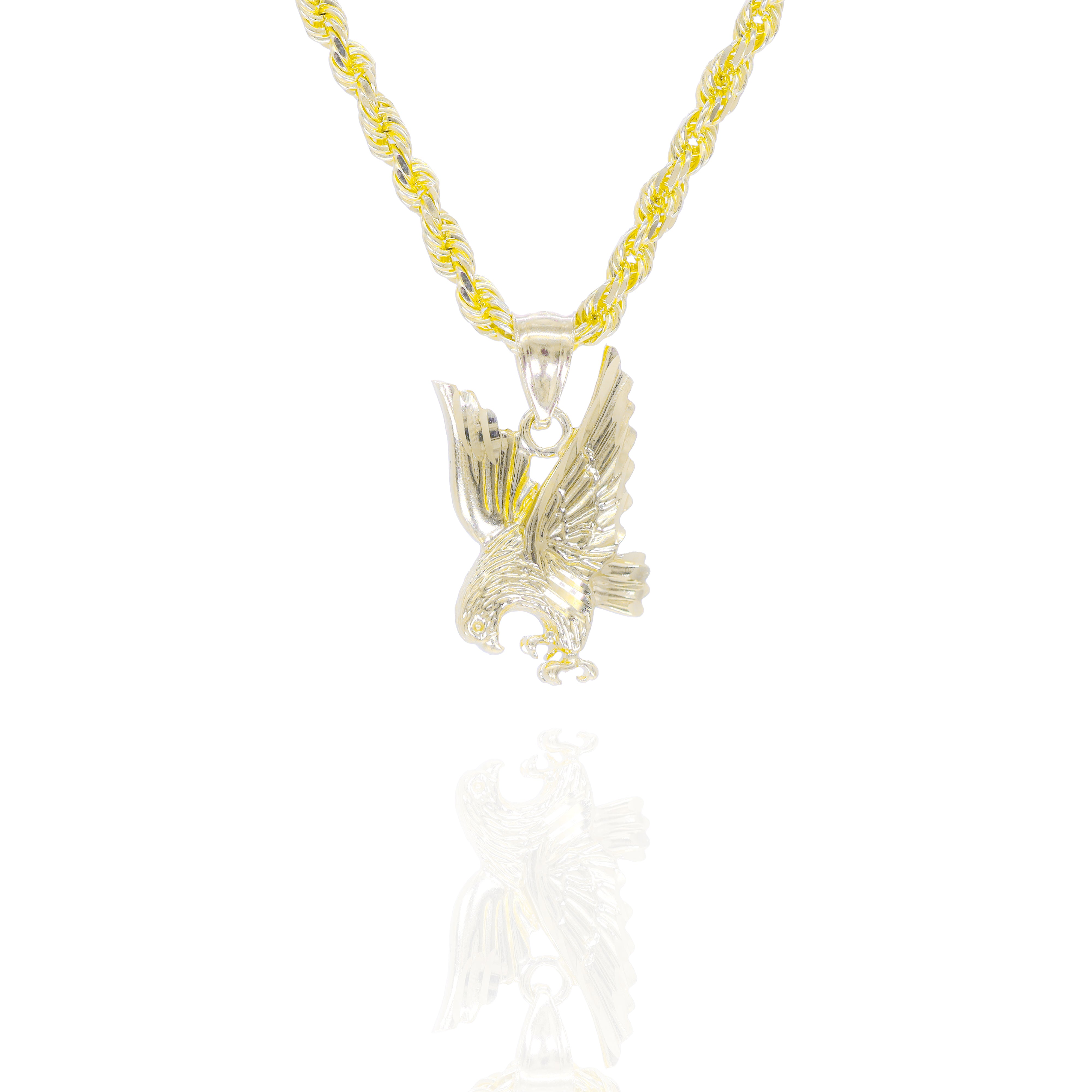 Gold eagle pendant on a gold chain diving down