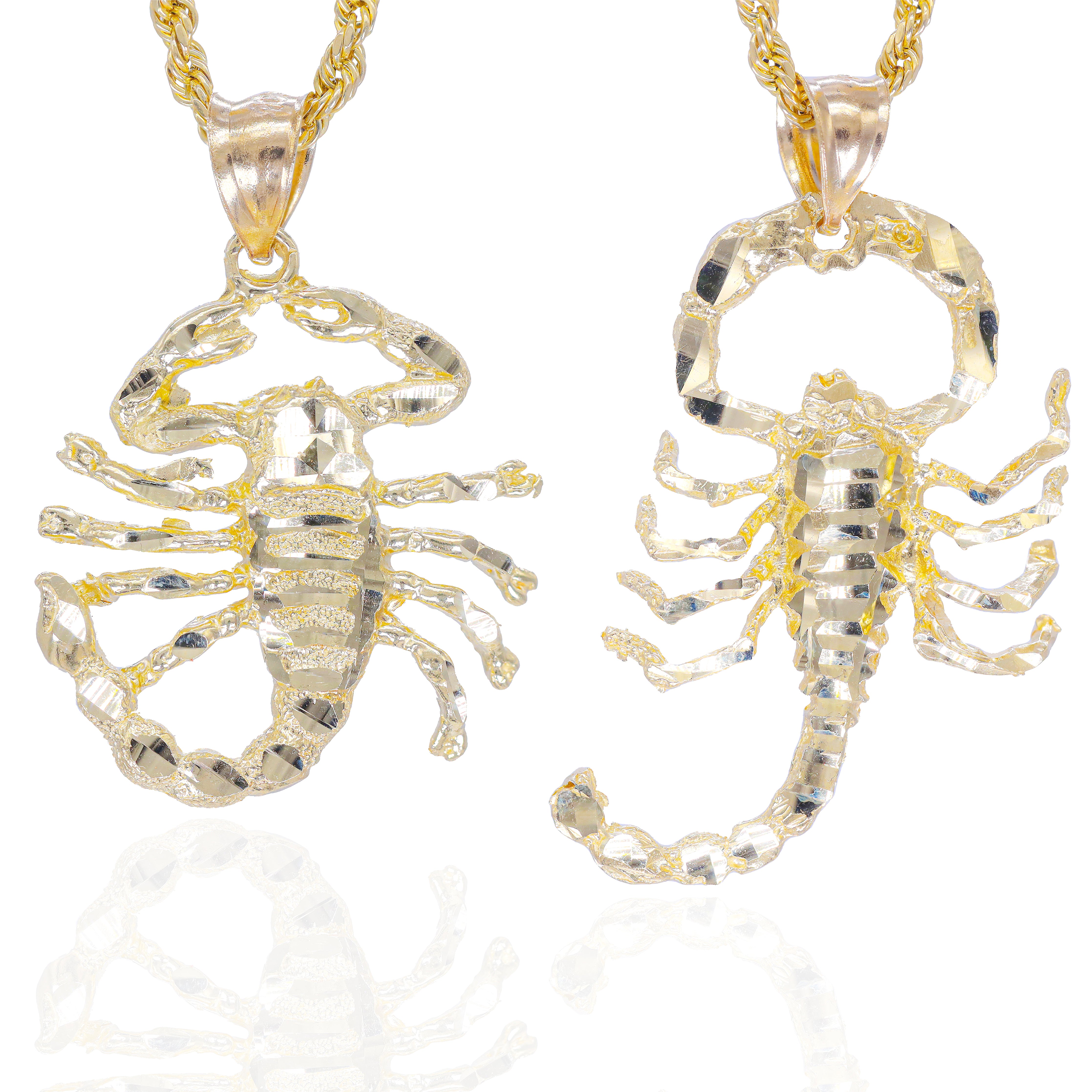 Two different size gold scorpion pendants on chains 