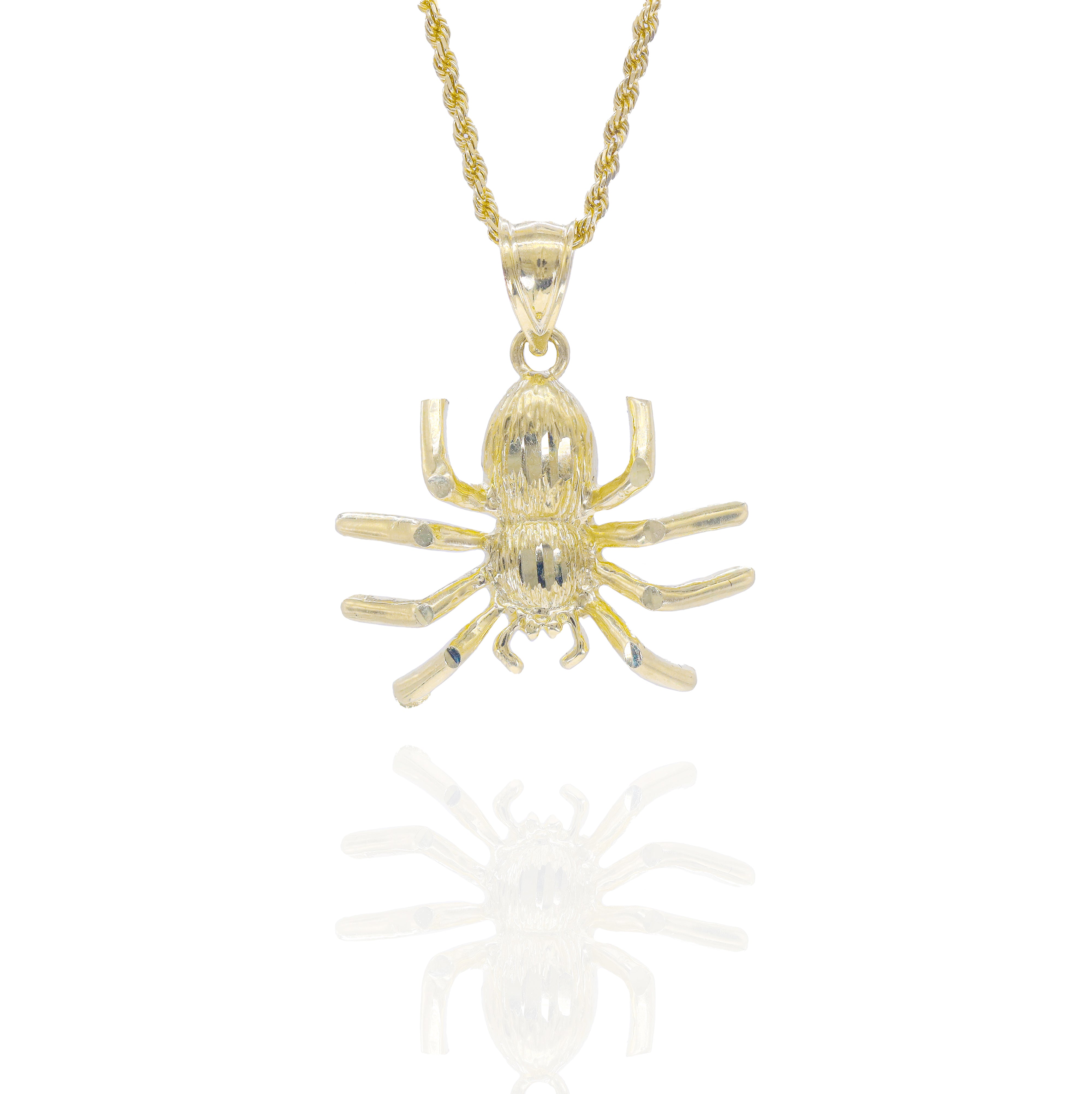 Gold spider pendant on a chain 