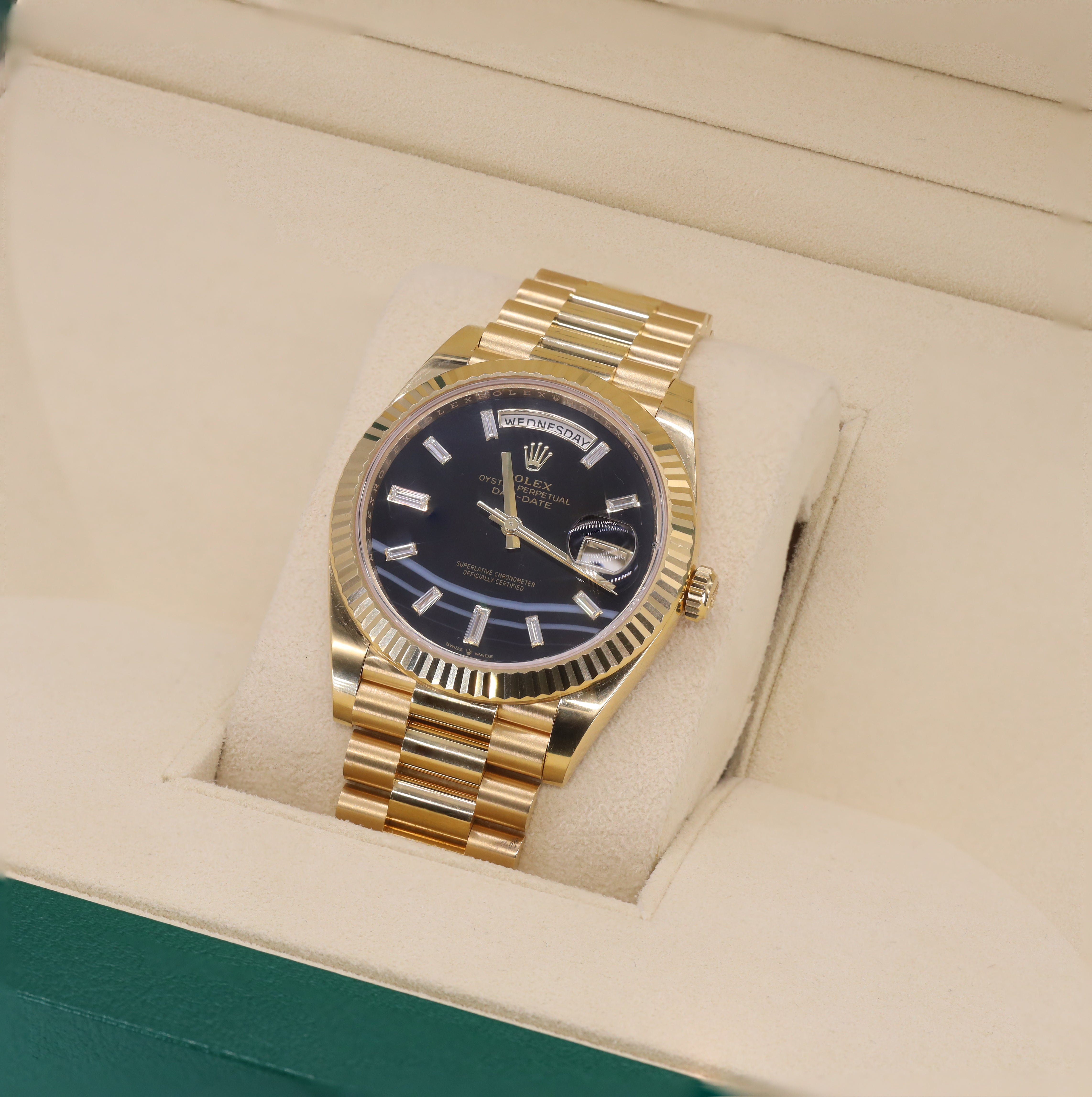 Rolex 228238 Day-Date 40mm Black Onyx Baguette Triple Wave Diamond Dial Yellow Gold