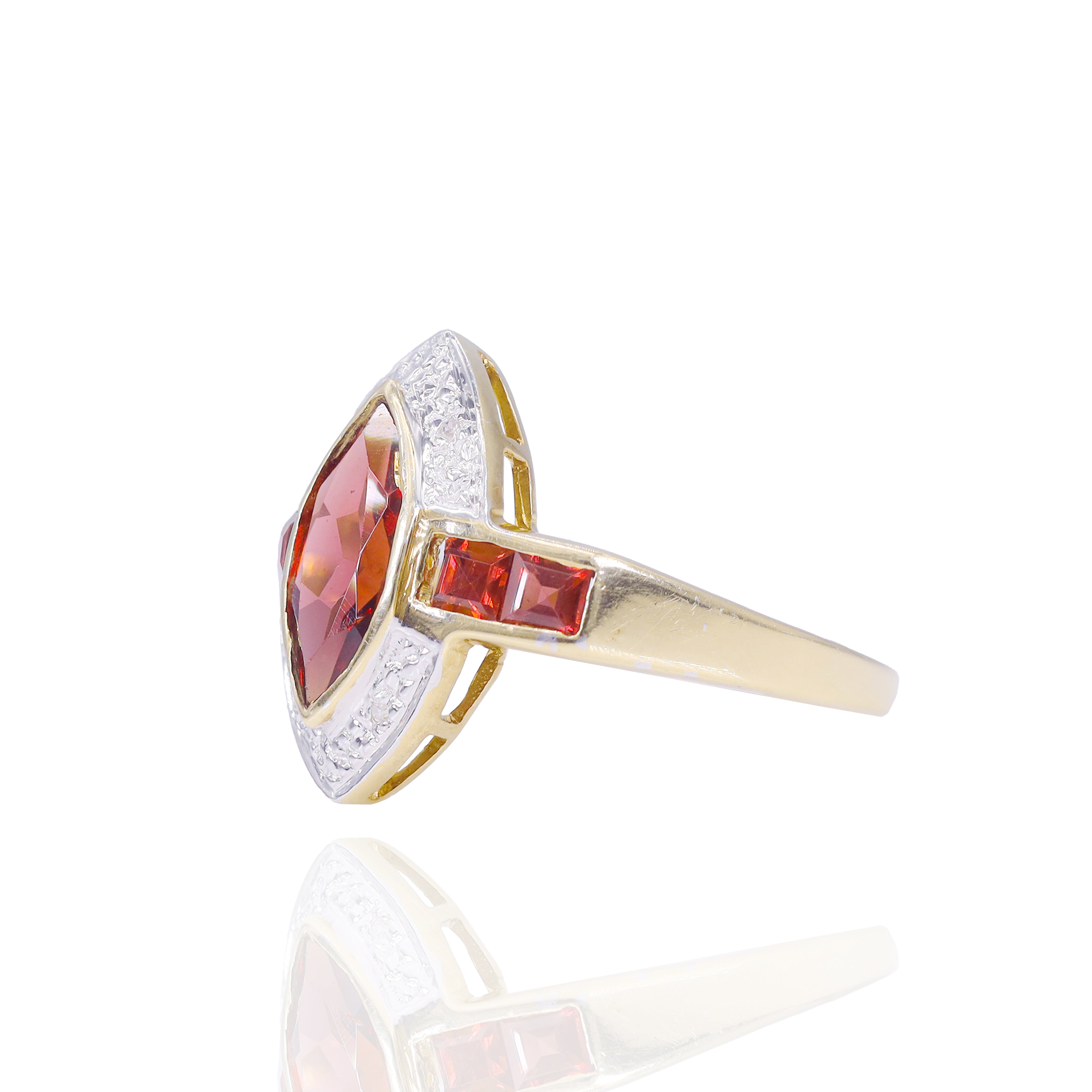 Marquise Shaped Garnet Diamond Ring